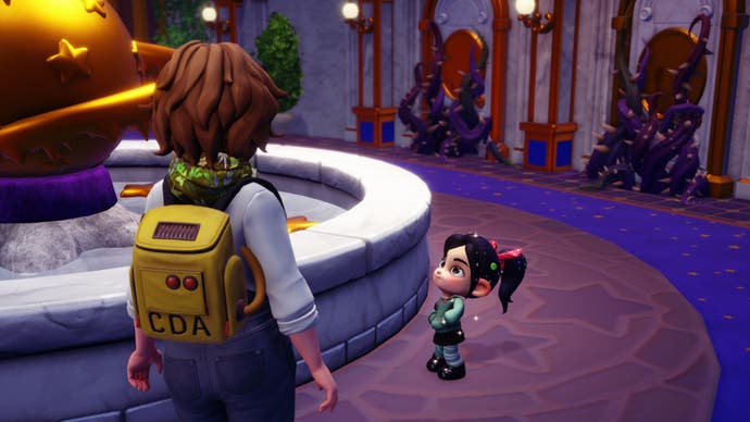 disney-dreamlight-valley-character-talking-to-non-glitching-vanellope-by-fountain-in-dream-castle.jpg