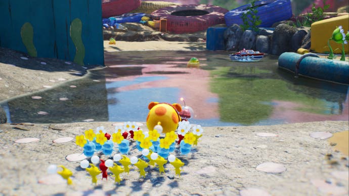 pikmin-4-nintendo-screenshot-yellow-red-ice-pikmin-and-oatchi-facing-water.jpg